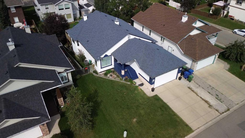 Photo of 223 COVE Drive, Chestermere, AB T1X 1E5 (MLS # A2252451)