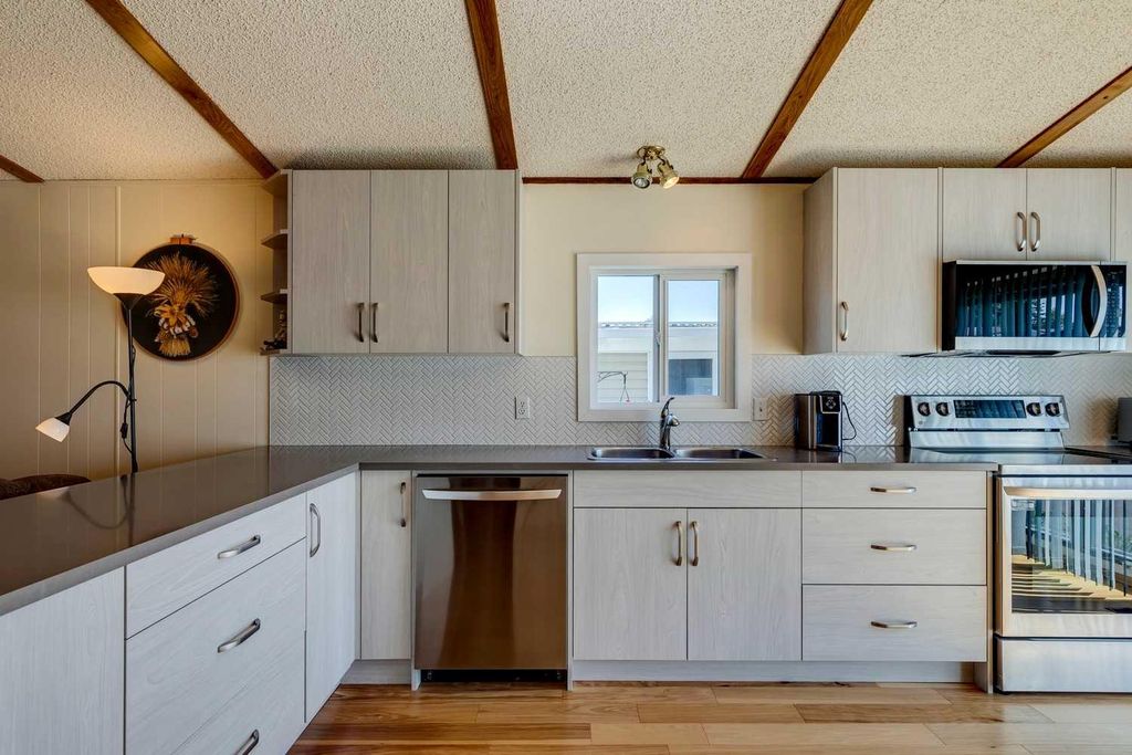 Photo of 99 Arbour Lake Road NW #101, Calgary, AB T3G 4E4 (MLS # A2274724)