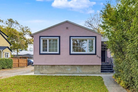 Photo of 319 11 Avenue NE, Calgary, AB T2H 2C3 (MLS # A2347725)