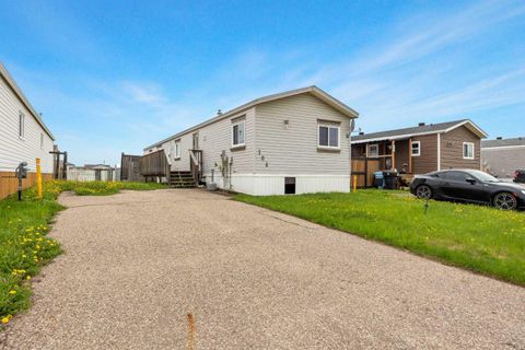 Photo of 104 Cree Road, Fort McMurray, AB T9K 1X3 (MLS # A2275636)