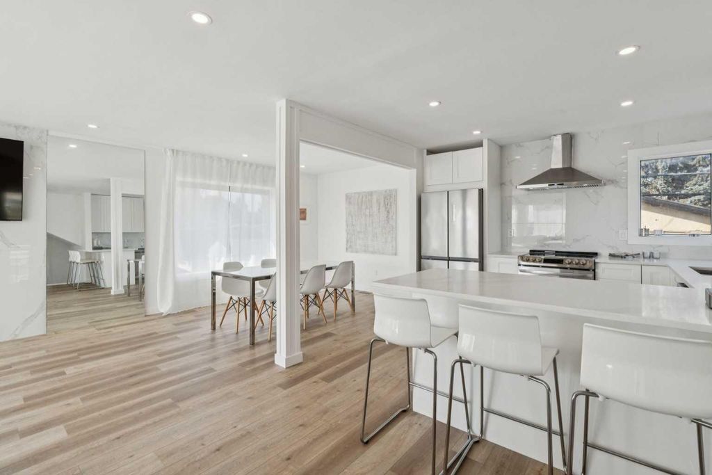 Photo of 809 9 Street NE, Calgary, AB T2E 7K2 (MLS # A2288150)