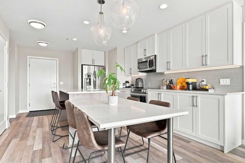 Photo of 8530 8A Avenue SW #320, Calgary, AB T3H 6A7 (MLS # A2335990)