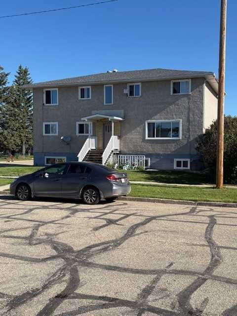 Photo of 4740 54 Avenue #1-5, Whitecourt, AB T7S 1A3 (MLS # A2338137)