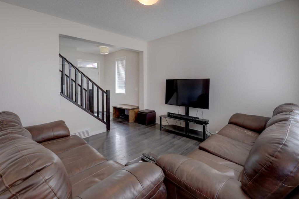 Photo of 16 Fireside Place, Cochrane, AB T4C 0R2 (MLS # A2309778)