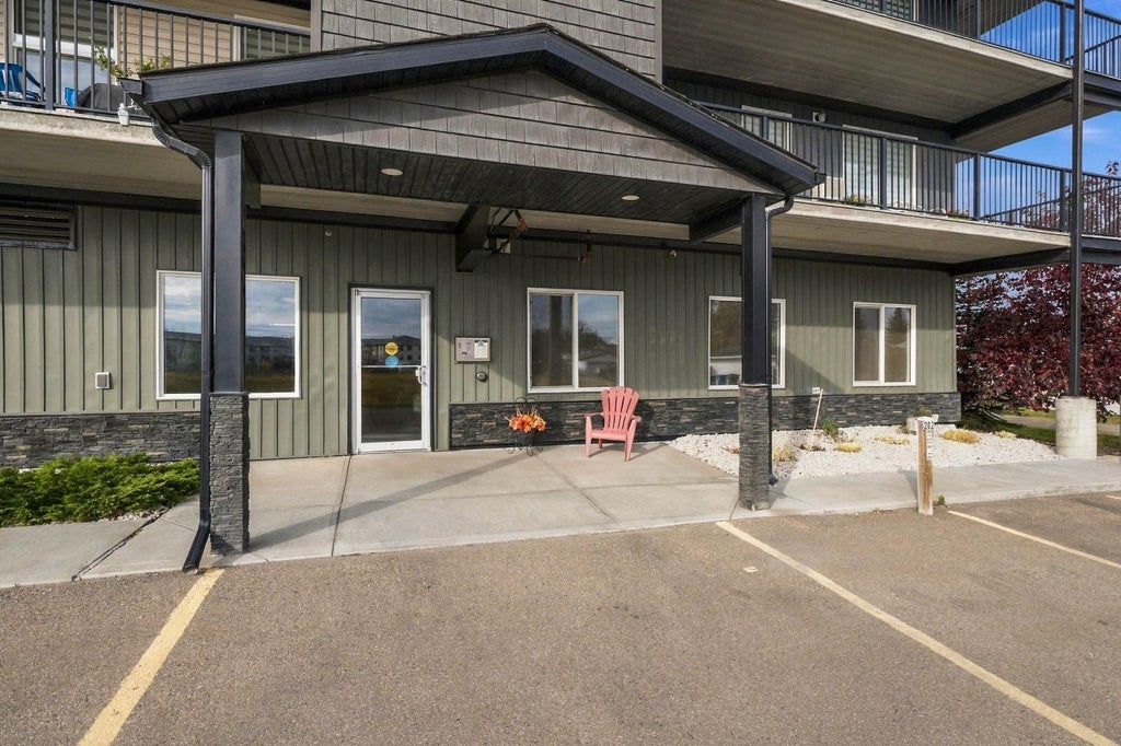 Photo of 4574 51 Avenue #406, Olds, AB T4H 0G3 (MLS # A2351044)