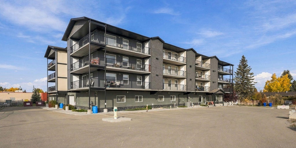 Photo of 4574 51 Avenue #406, Olds, AB T4H 0G3 (MLS # A2351044)
