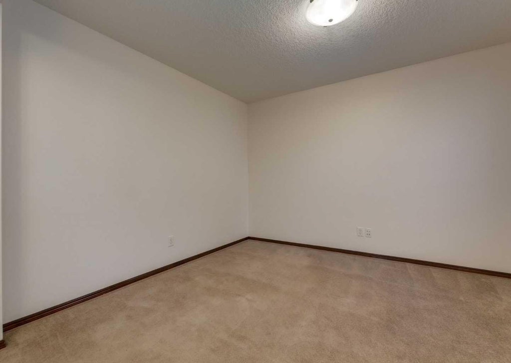 Photo of 424 Hidden Creek Boulevard NW, Calgary, AB T3K 6J1 (MLS # A2350920)