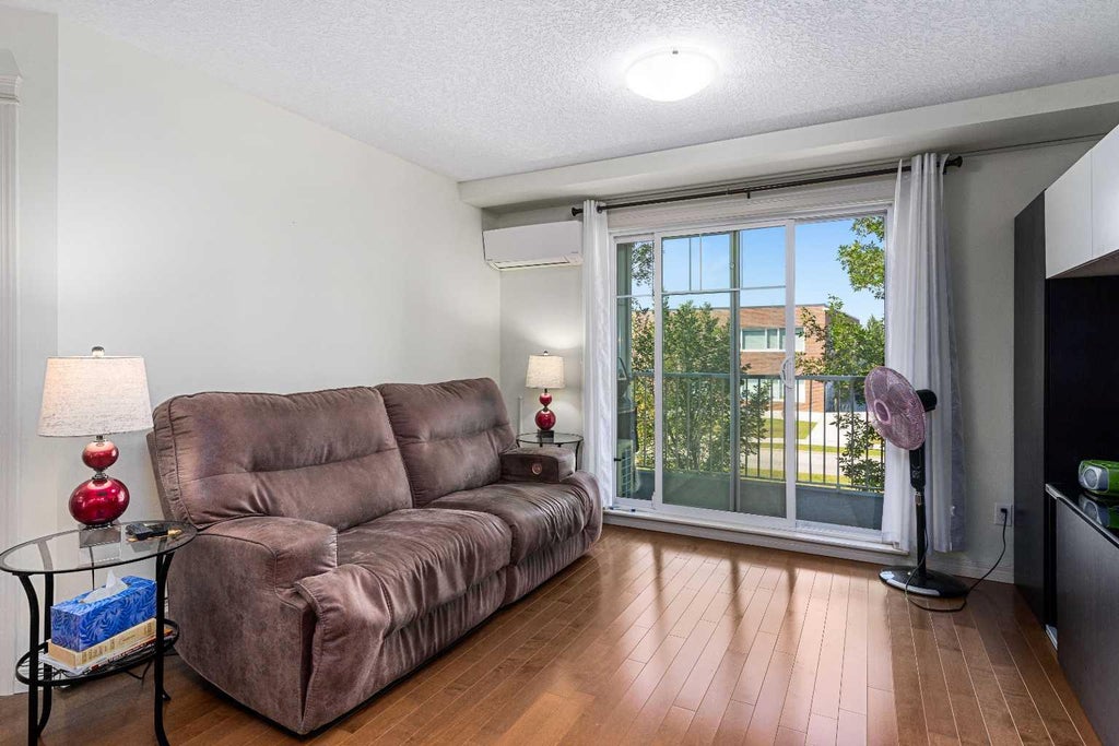 Photo of 304 Cranberry Park SE #208, Calgary, AB T3M 1W2 (MLS # A2337581)