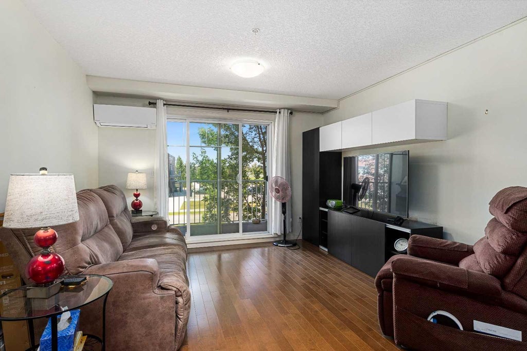 Photo of 304 Cranberry Park SE #208, Calgary, AB T3M 1W2 (MLS # A2337581)