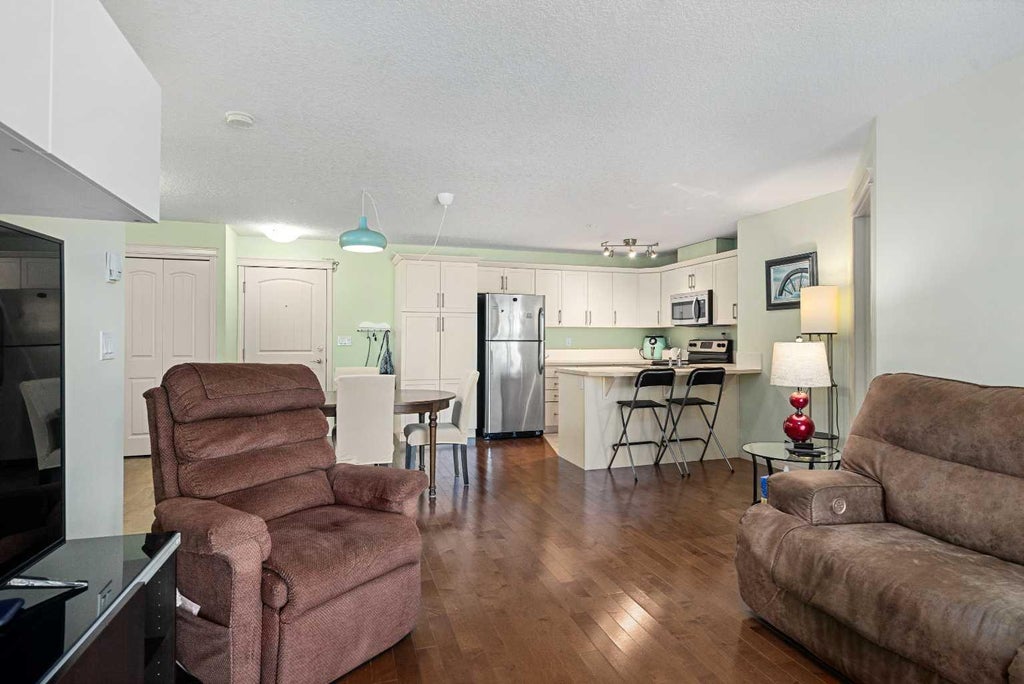 Photo of 304 Cranberry Park SE #208, Calgary, AB T3M 1W2 (MLS # A2337581)
