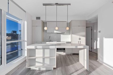 Photo of 615 6 Avenue SE #404, Calgary, AB T2G 1S2 (MLS # A2301578)