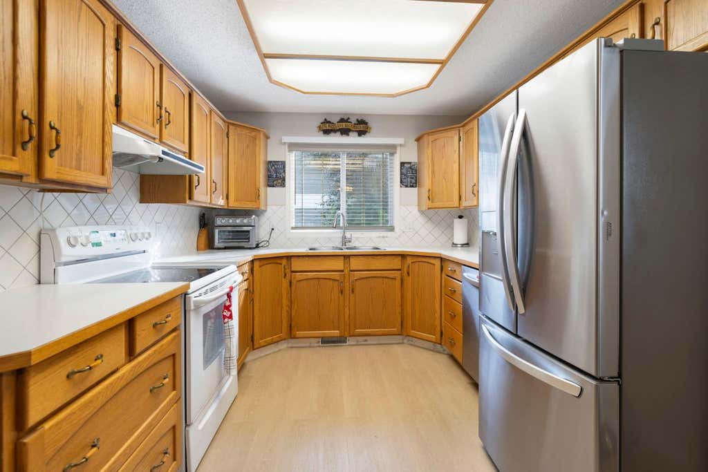 Photo of 76 Douglas Ridge Close SE, Calgary, AB T2Z 2M3 (MLS # A2335520)