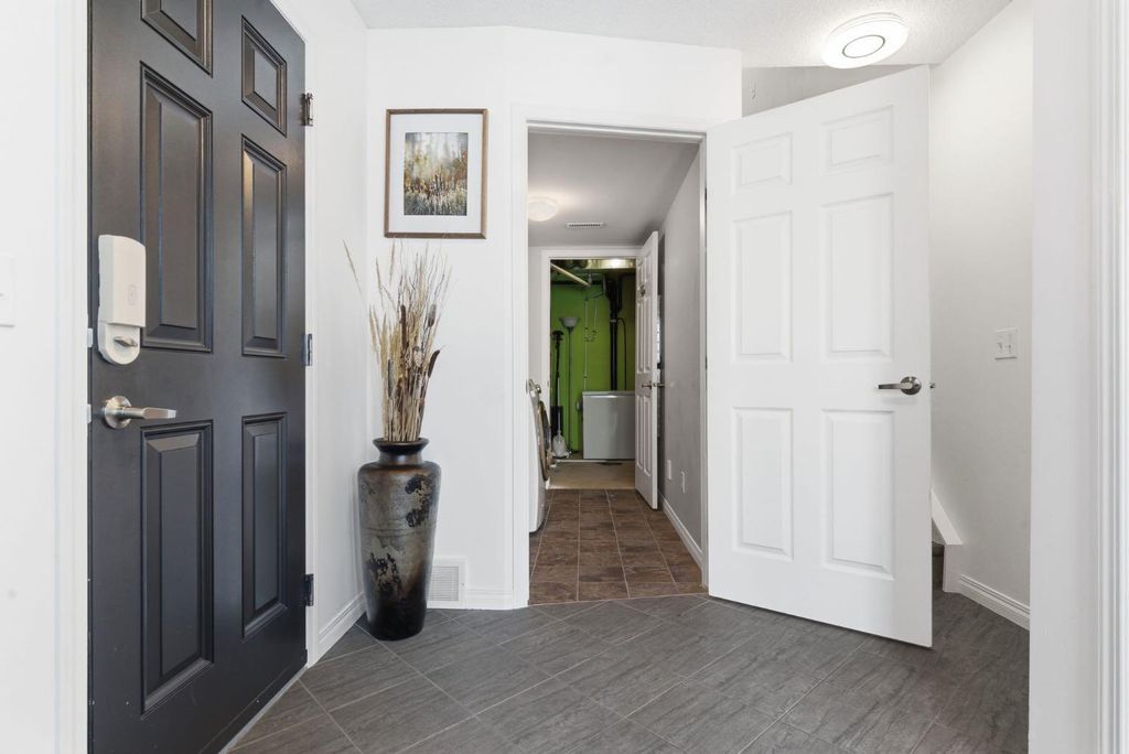 Photo of 405 Windstone Grove SW, Airdrie, AB T4B 2P9 (MLS # A2292789)