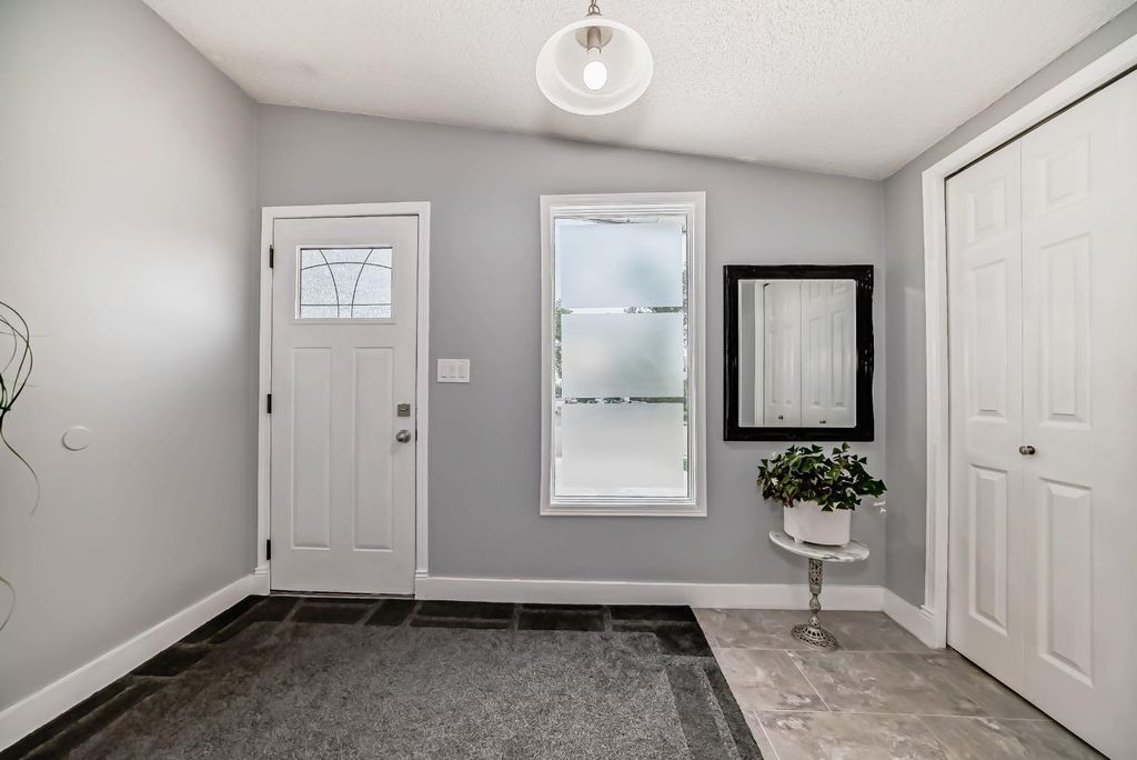 Photo of 5519 Buckthorn Road NW, Calgary, AB T2K 2Y6 (MLS # A2300683)