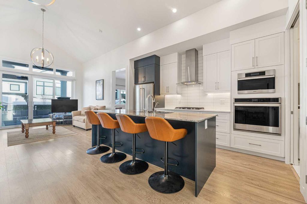 Photo of 12572 Crestmont Boulevard SW, Calgary, AB T3B 6J5 (MLS # A2291827)