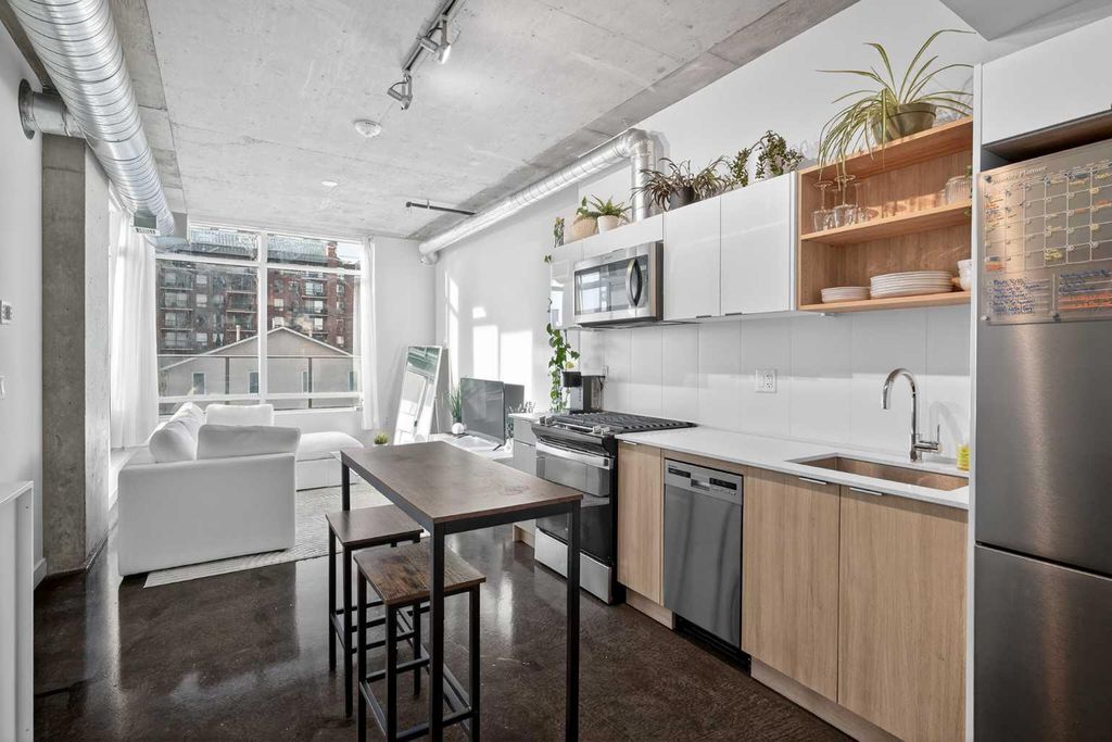 Photo of 1319 14 Avenue SW #203, Calgary, AB T3C 0W3 (MLS # A2313312)