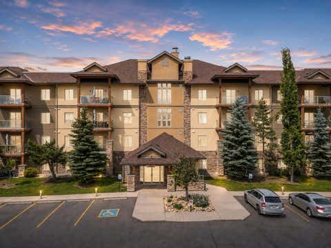 Photo of 92 Crystal Shores Road #4308, Okotoks, AB T1S 2N2 (MLS # A2329393)