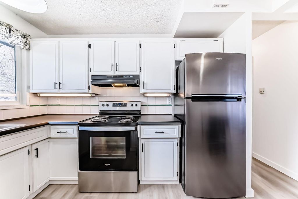 Photo of 1277 Lake Sylvan Drive SE, Calgary, AB T1J 3E2 (MLS # A2299778)