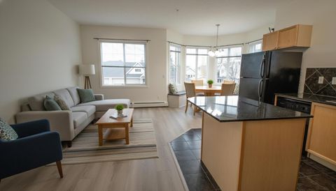 8 Prestwick Pond Terrace SE 202 Calgary AB T2Z 4P3