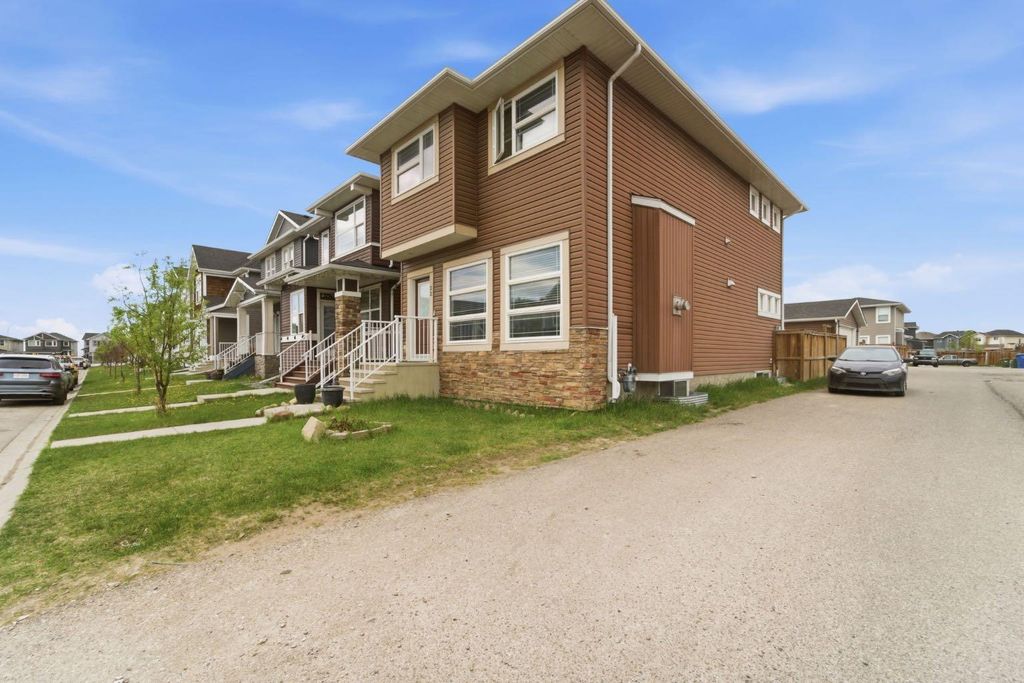 Photo of 22 Redstone Road NE, Calgary, AB T3N 0M3 (MLS # A2311491)