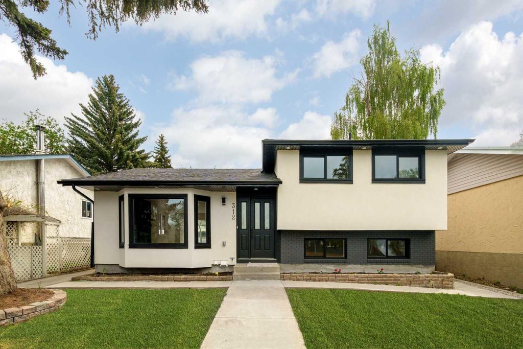 Photo of 312 Queensland Road SE, Calgary, AB T2J 3S6 (MLS # A2316310)