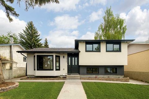 Photo of 312 Queensland Road SE, Calgary, AB T2J 3S6 (MLS # A2316310)
