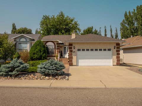 Photo of 66 Heritage Road W, Lethbridge, AB T1K 6T8 (MLS # A2339435)