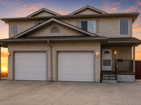 Photo of 136 Kodiak Crescent, Fort McMurray, AB T9K 2L9 (MLS # A2331519)