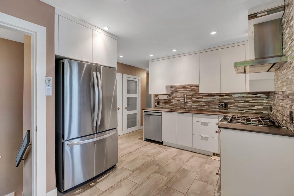 Photo of 212 Blackthorn Road NW, Calgary, AB T2K 3S3 (MLS # A2346351)