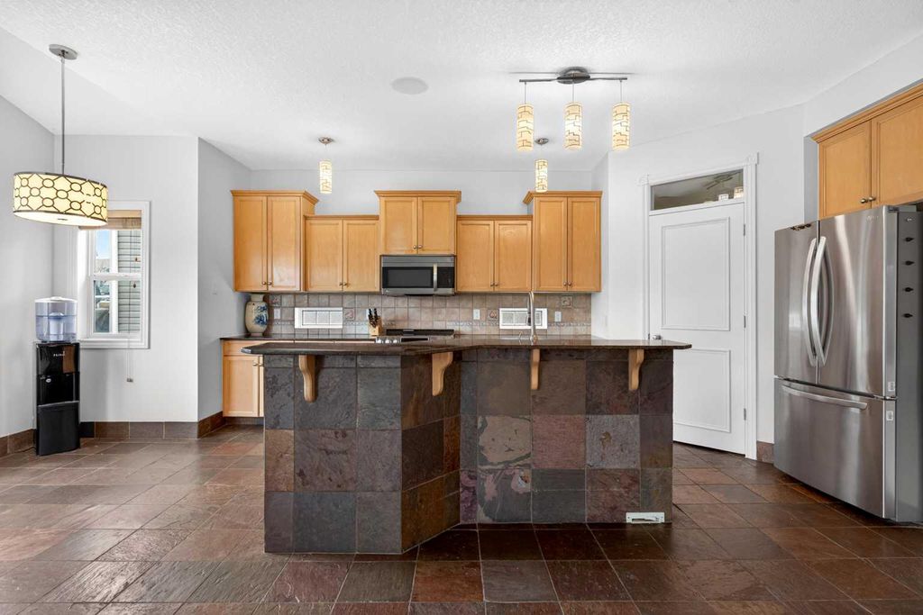 Photo of 172 COVE Drive, Chestermere, AB T1X 1E5 (MLS # A2309172)