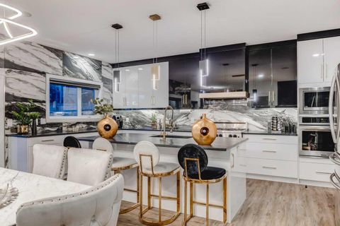 Photo of 630 Rocky Ridge View NW, Calgary, AB T3G 5C2 (MLS # A2260206)