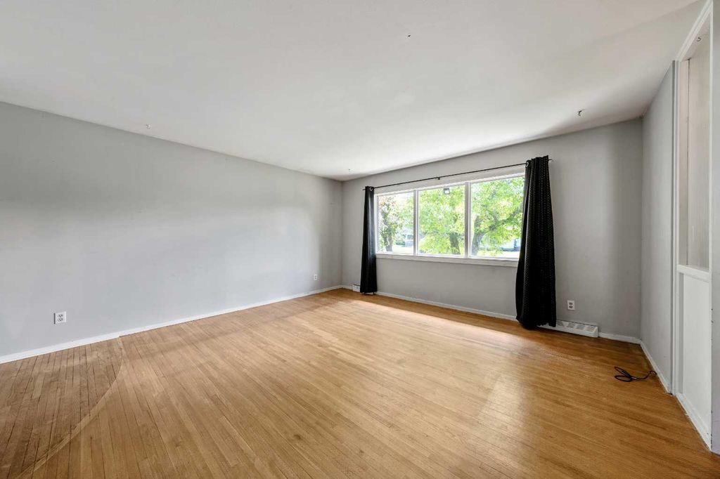 Photo of 1032 89 Avenue SW, Calgary, AB T2V 0W4 (MLS # A2318175)