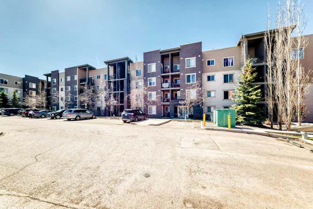Photo of 403 Mackenzie Way SW #4304, Airdrie, AB T4B 3V7 (MLS # A2319208)