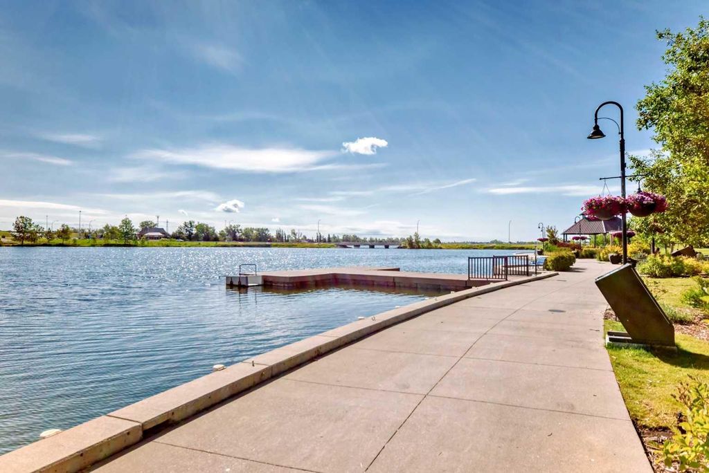 Photo of 371 Marina Drive #105, Chestermere, AB T1X 1V1 (MLS # A2284332)