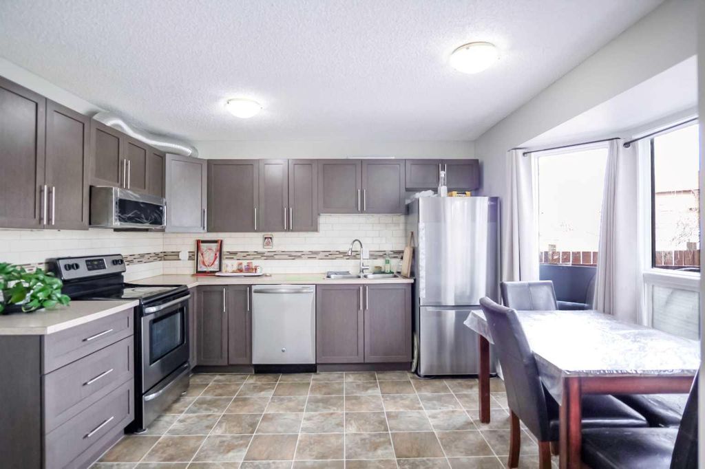 Photo of 52 Templeby Way NE, Calgary, AB T1Y 5N8 (MLS # A2294767)