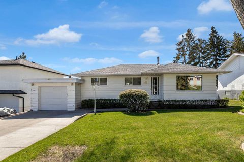 Photo of 1031 Thorneycroft Drive NW, Calgary, AB T2K 3K7 (MLS # A2309461)