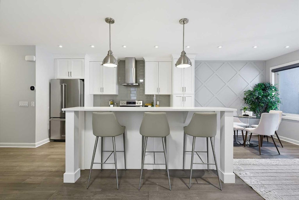 Photo of 530 56 Avenue SW #2, Calgary, AB T2V 0G7 (MLS # A2344979)