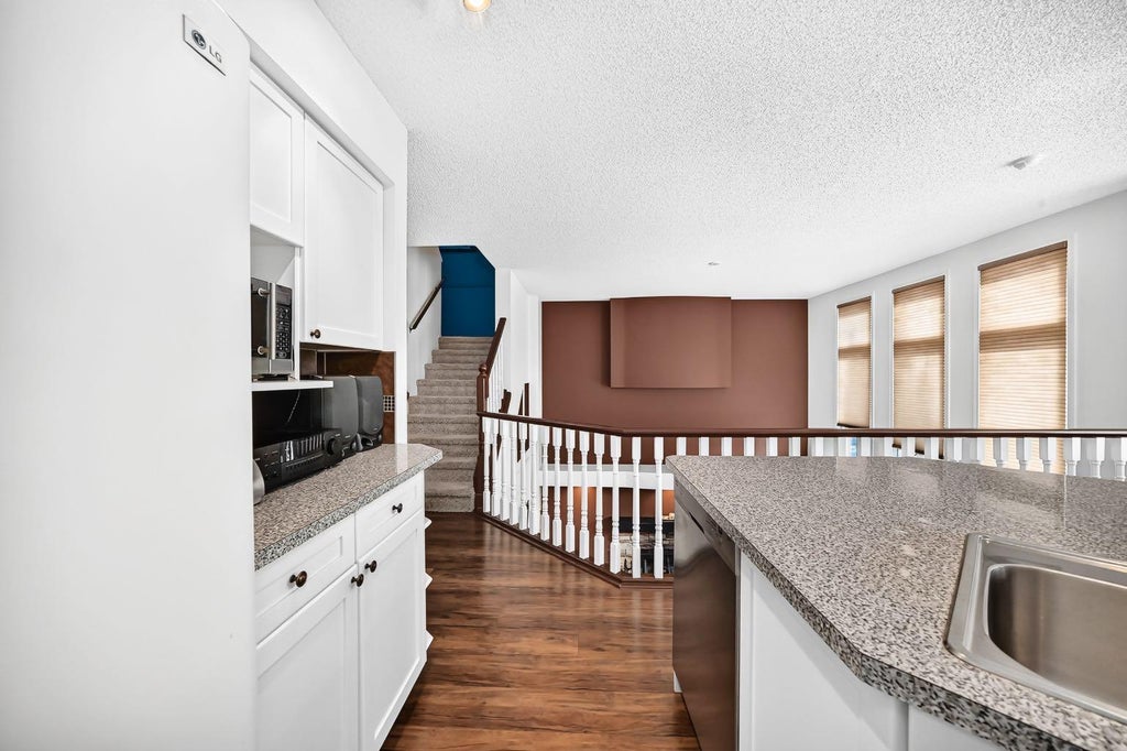 Photo of 14954 Mt Mckenzie Drive SE, Calgary, AB T2Z 2L4 (MLS # A2339210)