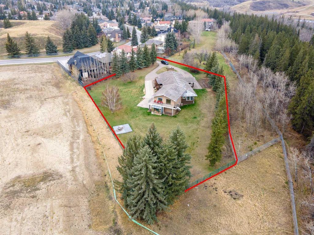 Photo of 1008 Shawnee Drive SW, Calgary, AB T2Y 2T9 (MLS # A2279086)