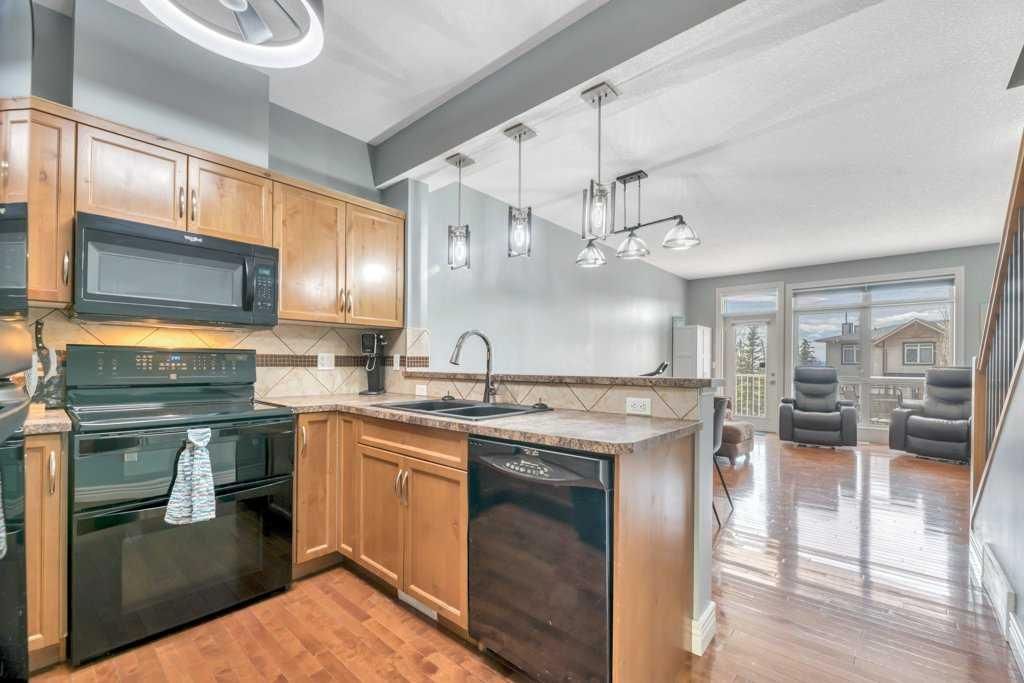 Photo of 172 Rockyledge View NW #8, Calgary, AB T3G 6B2 (MLS # A2309663)