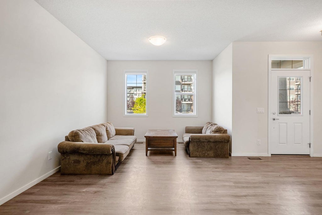 Photo of 61 Cityline Gate NE, Calgary, AB T3N 2H4 (MLS # A2337939)
