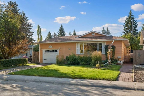 Photo of 1403 104 Avenue SW, Calgary, AB T2W 0A7 (MLS # A2347367)