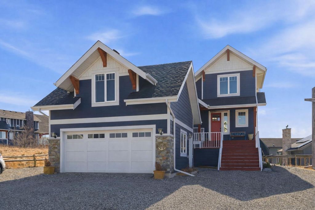 Photo of 419 Cottageclub Cove, Rural Rocky View County, AB T4C 1B4 (MLS # A2294510)