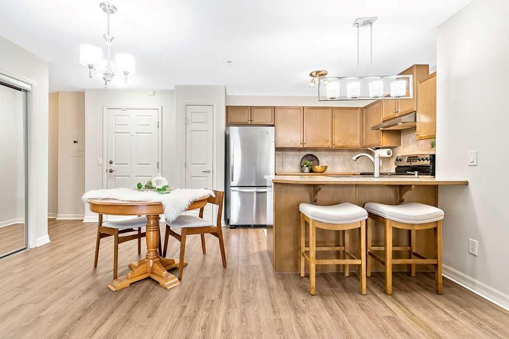 Photo of 92 Crystal Shores Road #2313, Okotoks, AB T1S 2M9 (MLS # A2281056)