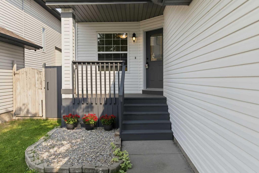 Photo of 307 Hidden Cove NW, Calgary, AB T3A 5G8 (MLS # A2344219)