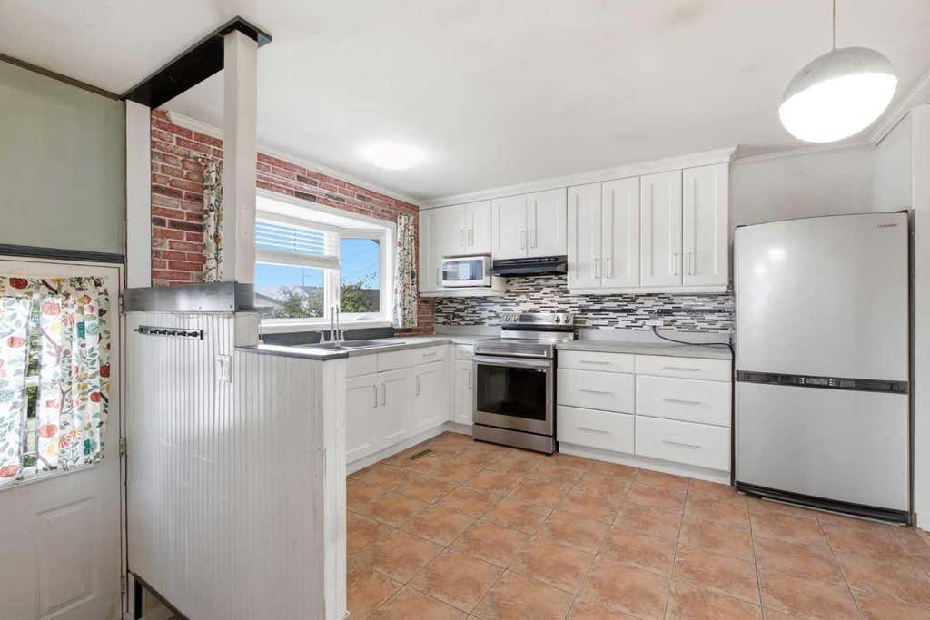 Photo of 7807 Olympia Bay SE, Calgary, AB T2C 1N7 (MLS # A2334906)