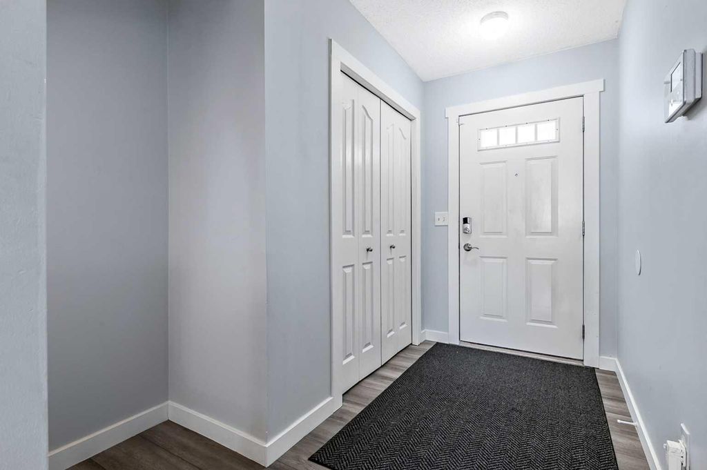 Photo of 156 Canoe Drive SW #27, Airdrie, AB T4B 2Z3 (MLS # A2300589)