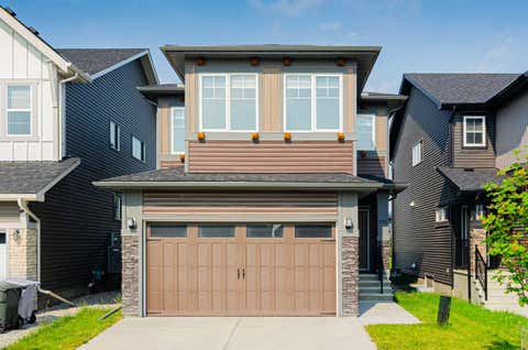 Photo of 293 Carringsby Way NW, Calgary, AB T3P 1T6 (MLS # A2331276)