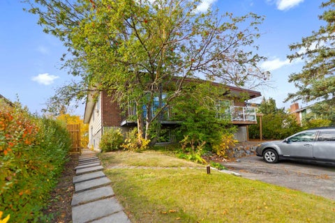 Photo of 221 Theodore Place NW, Calgary, AB T2K 5L7 (MLS # A2350540)