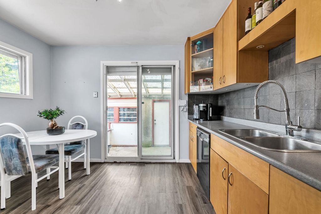 Photo of 3156 Blakiston Drive NW, Calgary, AB T2L 1L8 (MLS # A2313668)